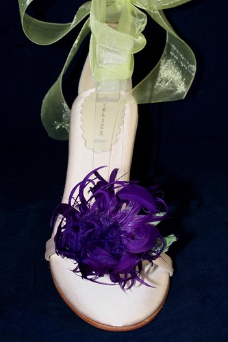 Atelier Shoes' ivory wedding wedges with lime green sash and purple flower