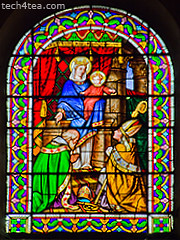 Stained glass window in Provencal church.