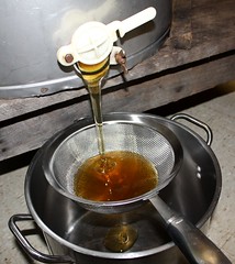 straining the honey