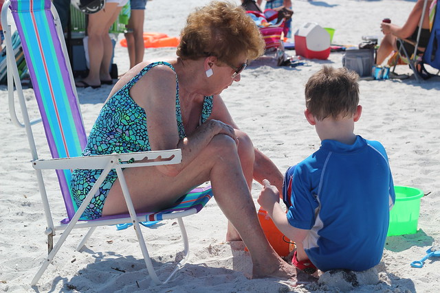 Making sand castles with Great Grandma