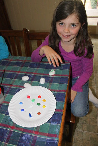 Esther painting eggs