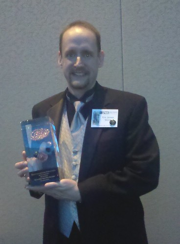 Eric James Stone with his Nebula Award