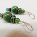 http://www.etsy.com/listing/71774078/ocean-inspired-ceramic-dangling-earrings?ref=v1_other_1