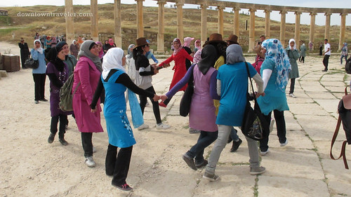 Schoolgirls dancing and singing in Jerash Jordan