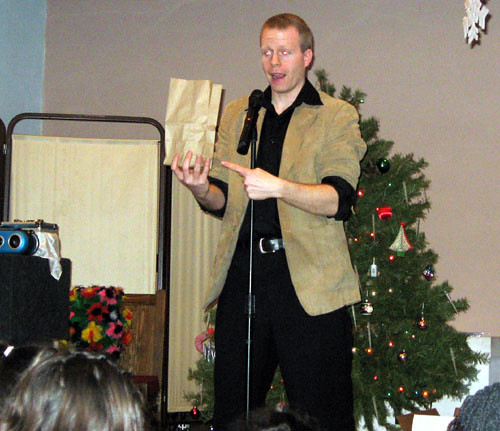 Magician Eddy Ray Performing at a Christmas Event by eddyraymagic1