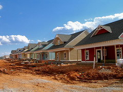 new houses under construction (by: Je Kemp, creative commons license)