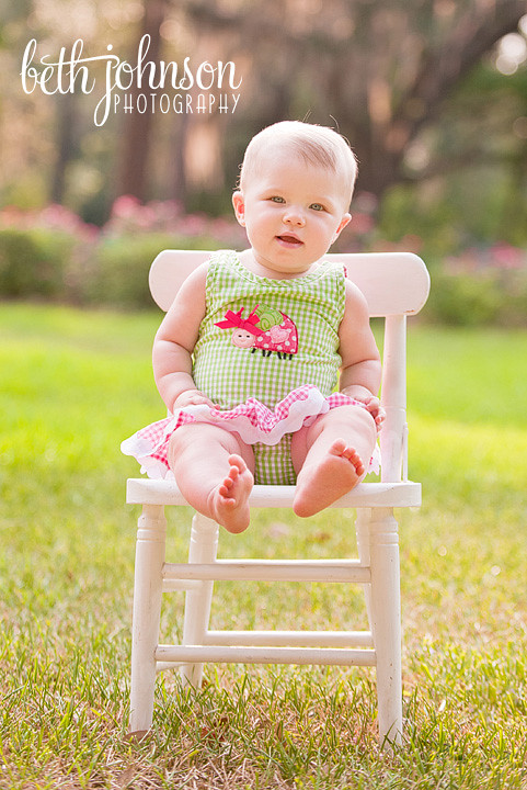 nine month old baby girl in white chair in tallahassee