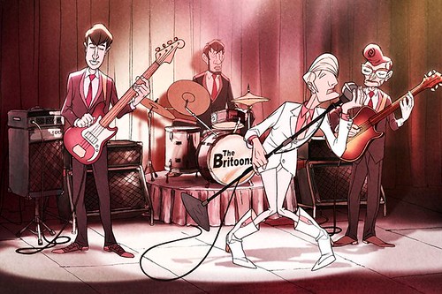 Animated boy band performs on a stage. The lead singer, who is blond with red lips, a pink shirt, a white suit, and pink-and-white boots, is dipping and singing into his microphone with tiny legs parted at the knee. His bandmates are all brown-haired and similarly made-up, but they're in dark suits. The drummer's set reads "The Britoons". Image via allocine.com.
