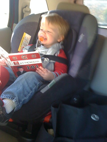 101120 Coleman reading Gamecocks book in car