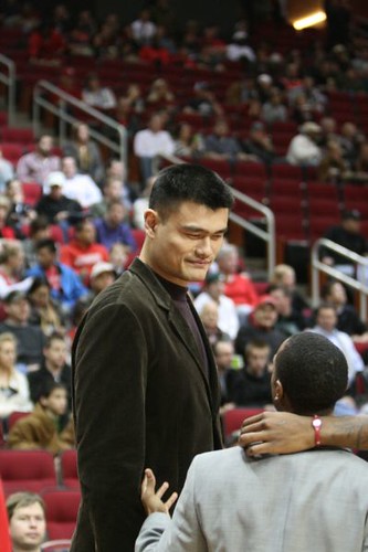 December 27th, 2010 - Yao Ming talks with Houston Rocket guard Ish Smith before the Rockets-Wizards game