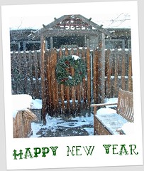 snowy gate with wreath