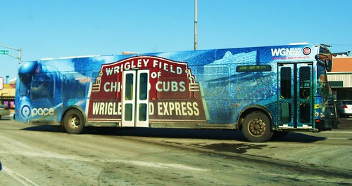 Pace 2002 Orion low floor transit bus with Chicago Cubs / Wrigley Field Express decal markings. Niles Illinois USA. Wednsday, January 19th, 2011. by Eddie from Chicago