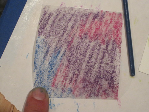 before spraying the Caran D'Ache Neocolor water soluble crayons with water on the Lutradur
