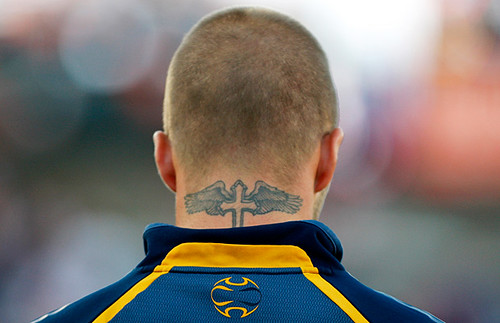  this tattoo and his shaved head made Beckham look like a hooligan.