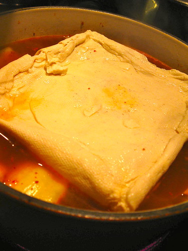 Adding my homemade tofu block to the korean beef stew