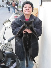 Lady Holding Her Cat
