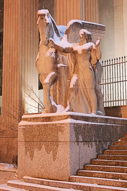 Soldiers Memorial, in downtown Saint Louis, Missouri, USA - allegorial figure, at night in the snow