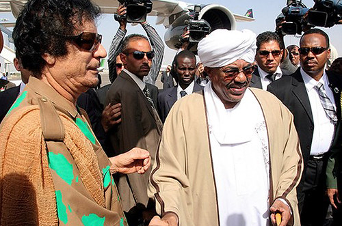 Libya leader Muammar Qaddafi with Sudan President Omar Hassan al-Bashir in Khartoum. Libya, Egypt and Mauritania have sent their leaders to Sudan in an effort to minimize tensions in the run-up to the Jan. 11, 2010 referendum on the future of the South. by Pan-African News Wire File Photos