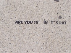 Are you 15 (m)in(u)t(e)s lat(e ?) -- vinyl letter installation, St. Paul Street, near Penn Station, Baltimore