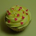 Valentines cupcake with bright pink heart sprinkles