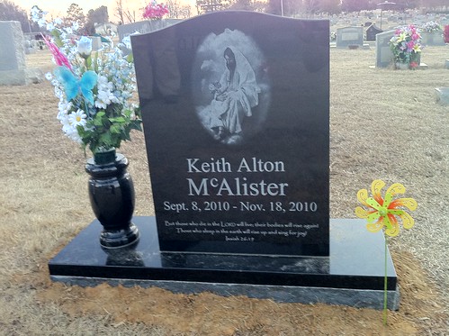 New flowers and a pinwheel for Keith's grave