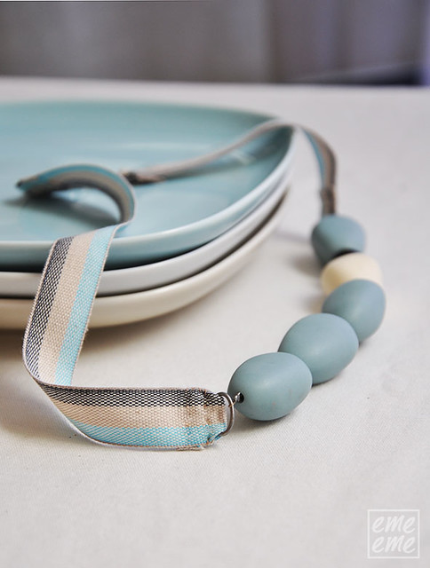 Necklace with light blue resin beads and linen ribbon