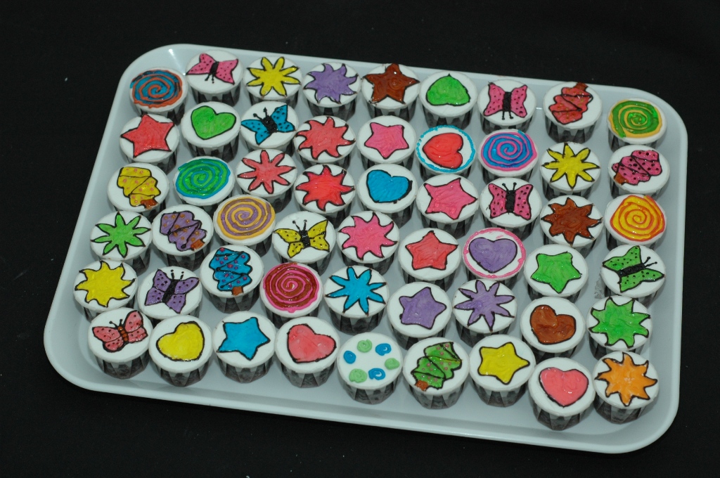 colorful cupcakes cartoon. house emo cupcakes cartoon.