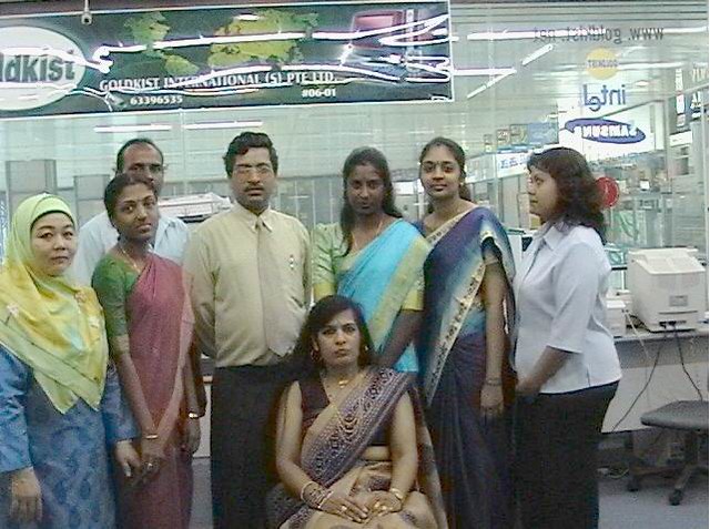 Mr H D Gupta with his Singapore staff, picture from Goldkist International website