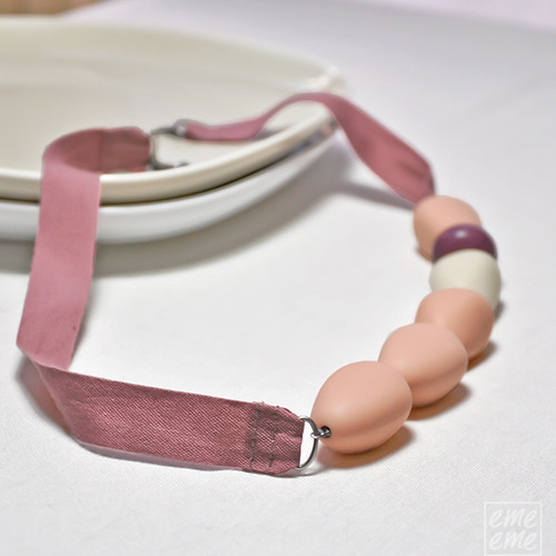 Necklace with pink resin beads and linen ribbon
