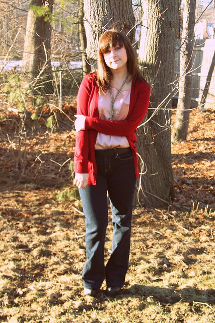 peach blouse, flare jeans, black wedges, maroon cardigan, gold necklaces