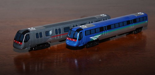Diecast models of MTR A-Stock EMUs: Tung Chung and Airport Express liveries