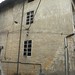 [senza titolo]; 1988. Acrilico e vetro su muro, cm 180x100+180x100.<br />
Maglione, Via Castello.<br />
