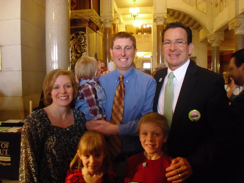 Governor Dannel Malloy (right) congratulates Matthew Peckham on winning the Connecticut Outstanding Young Farmer Award.