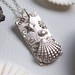 SILVER SHELL NECKLACE
