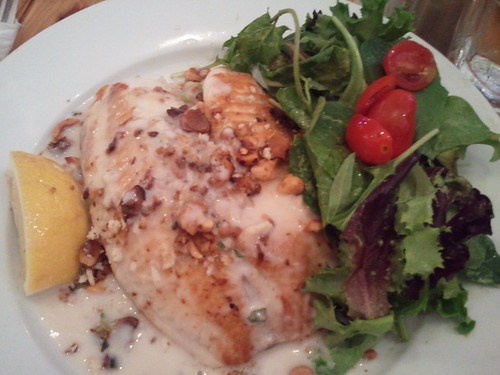Macadamian nut crusted tilapia with coconut rice and mixed greens