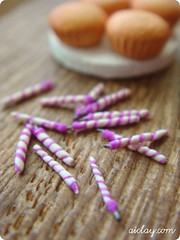 Miniature candles - after blowing out the flame.