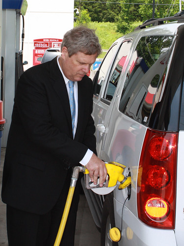 Agriculture Secretary Tom Vilsack pumps gas after speaking about the benefits of Ethanol E-85 at a gas station in Nashville, TN, on Monday, May 23, 2011.