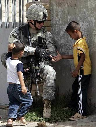 american soldier with children