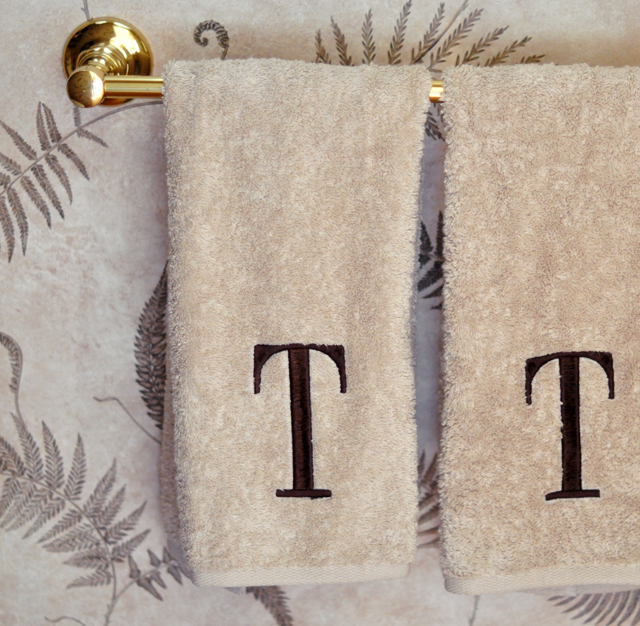 monogrammed T towels in guest bathroom
