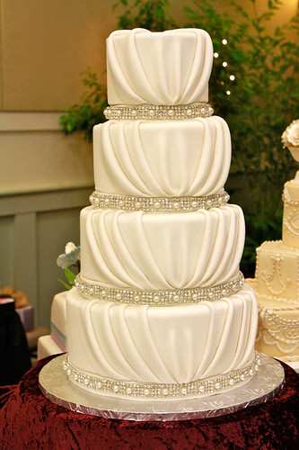 We'll have this glamorous wedding cake and maybe release a dove or two 