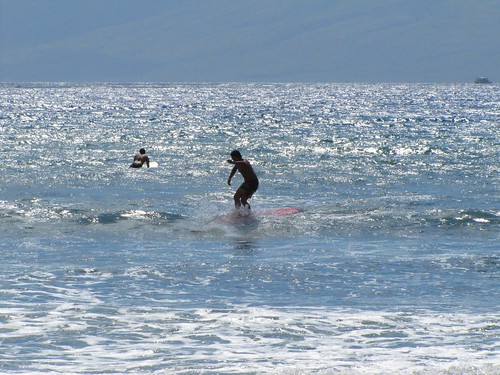 surfer with red board