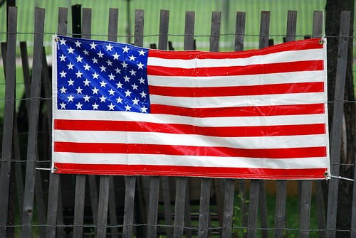 Big Flag on Fence