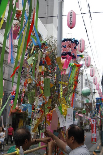 Men preparing the streamers for Tanabata festival 2