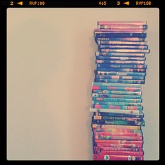 How does one arrange DVDs attractively?