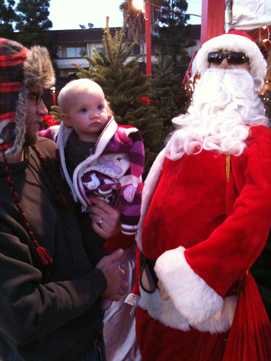 delilah at the christmas tree lot with hollywood santa manequin