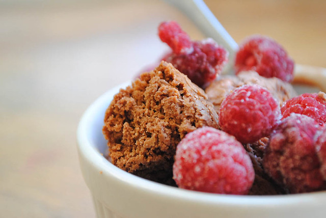 chocolate ice cream with frozen raspberries and brownie bits