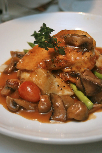 Chicken Marsala - sauteed chicken scallopine nestled in Marsala mushroom sauce, served with buttery mashed potatoes and fresh vegetables
