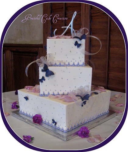 Purple and White Wedding Cake with Butterflies