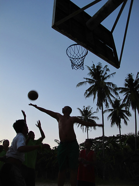 adarna boys basketball game at dusk