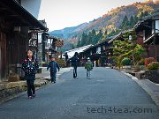 Colour photo of kids going to school in Japan